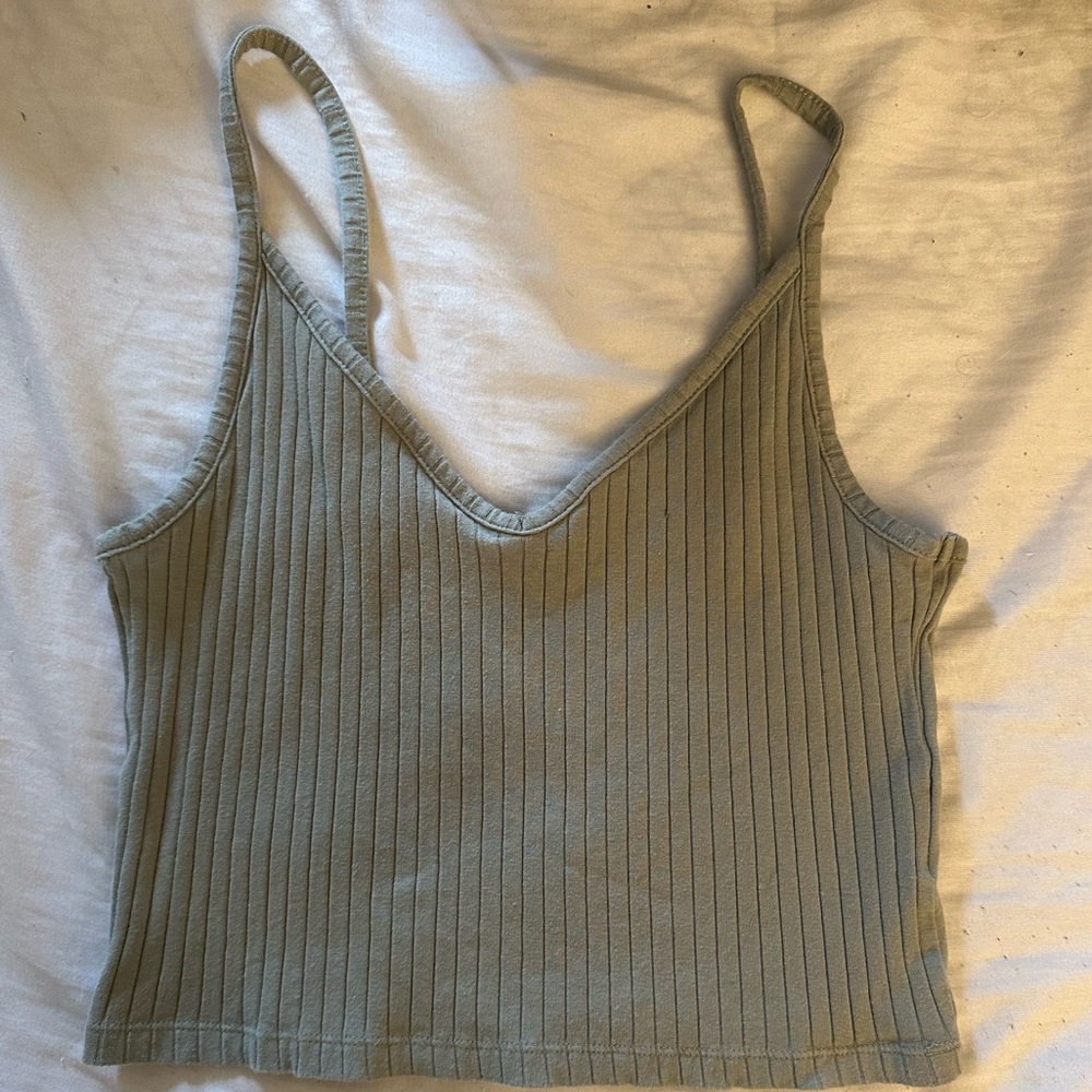 Light green ribbed tank top crop.